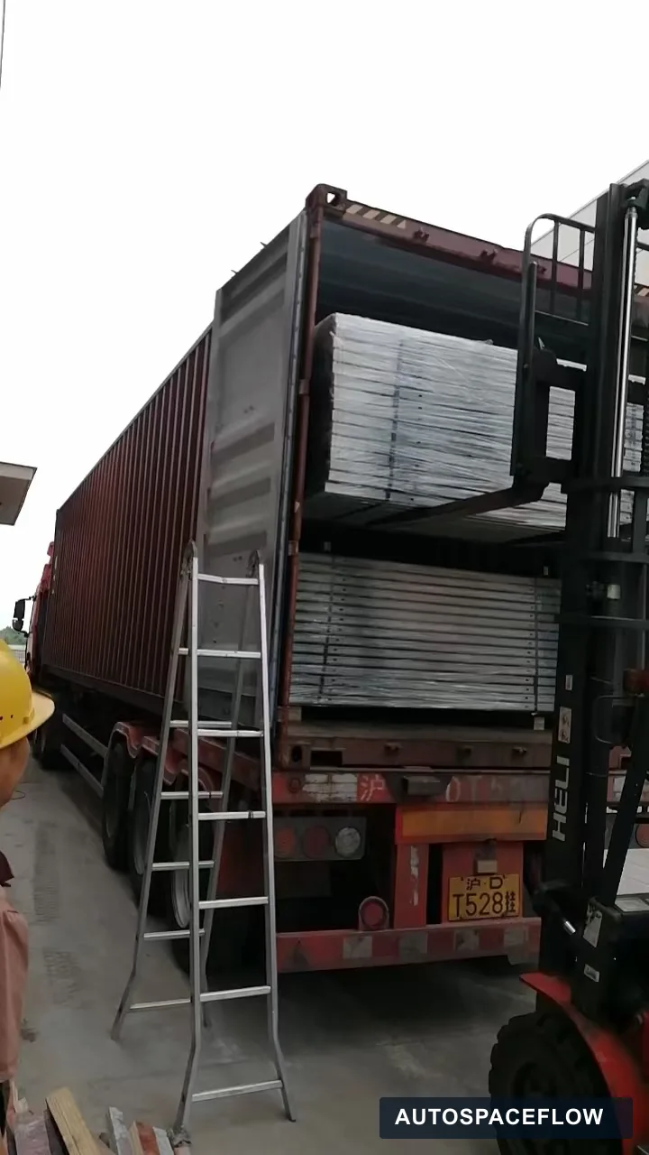 Puzzle parking platforms being loaded into a container for delivery to Vietnam